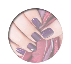 Polished Mobile Nails - female hand holding scarf with purple nails